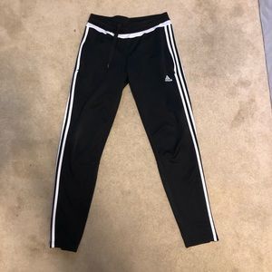 Black and white stripe adidas training pants